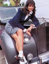 Phoebe Cates sitting on a Bentley, 1982