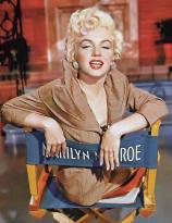 Marilyn Monroe in her chair on set in 1954