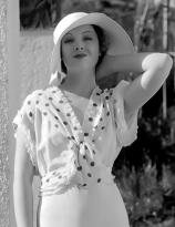 Myrna Loy in a hat