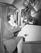 Stewardess Isle Berger shows the first full length sound movie on a transatlantic flight - PanAm 1945